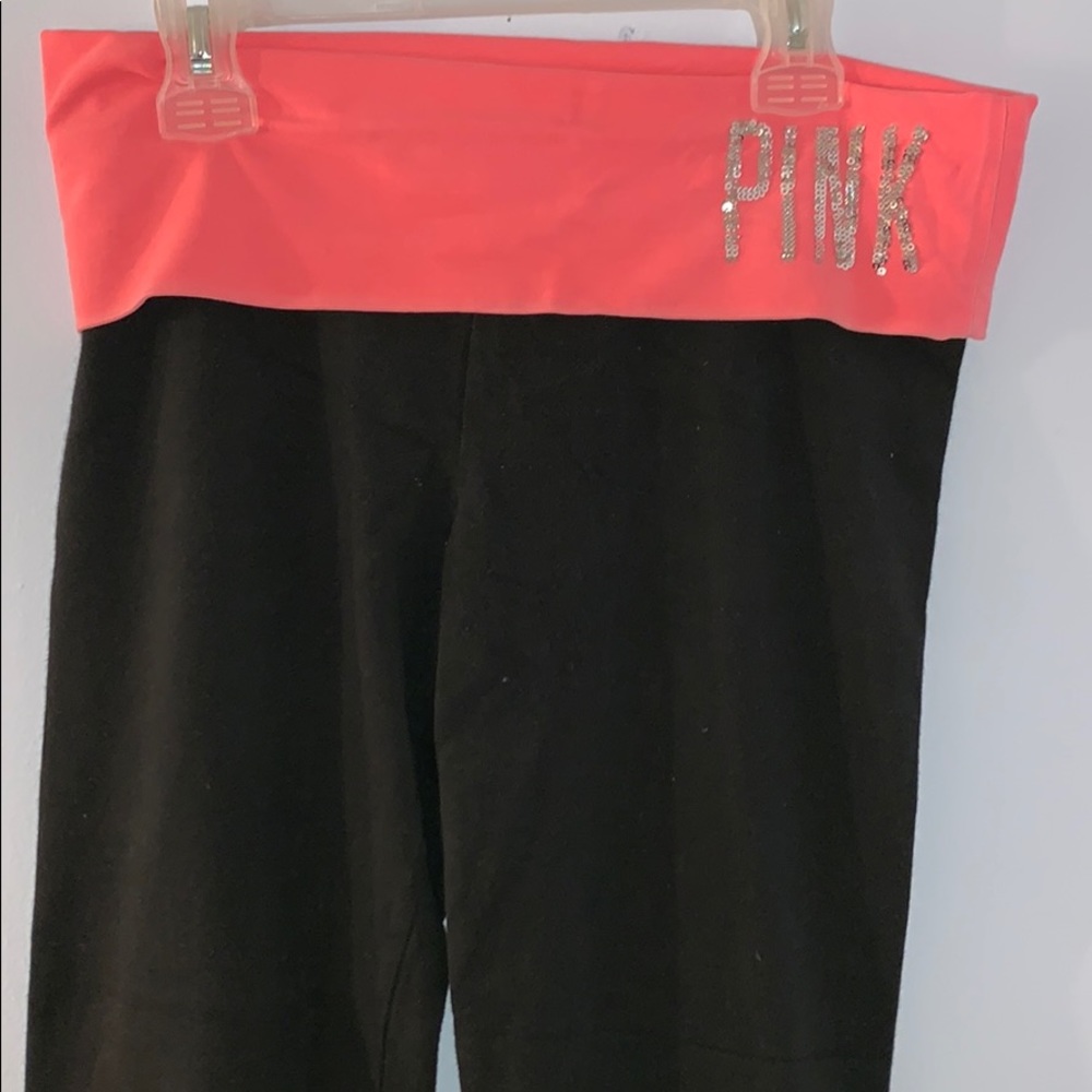 Pink waist band black yoga pants
